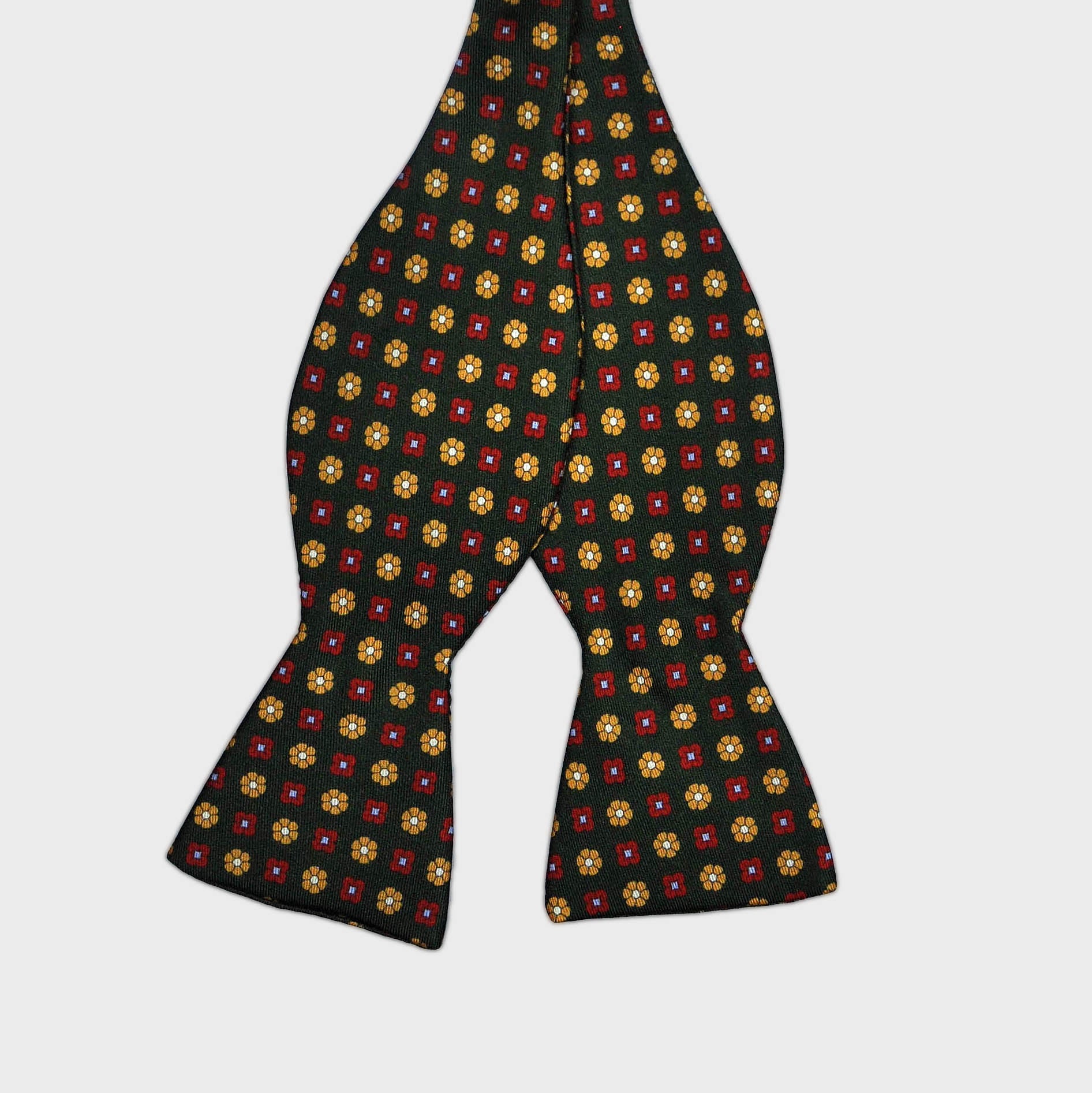 English Printed Silk Little Flowers Repeat Bow Tie in Bottle Green, Red & Yellow